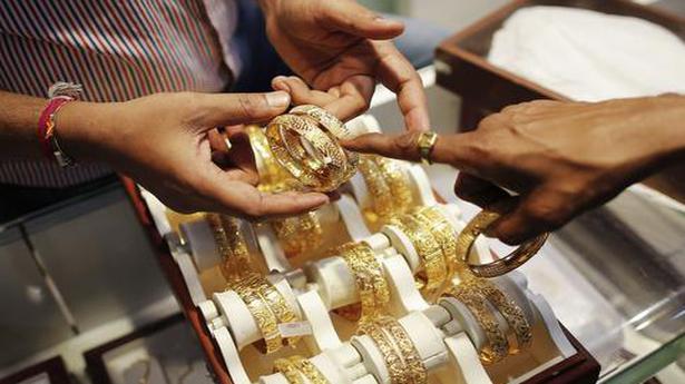 Gold declines ₹54, silver tumbles ₹573 on global cues