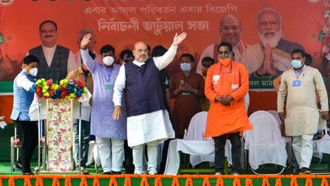 Union Home Minister and BJP leader Amit Shah gestures during an election rally at Buniadpur in West Bengal's South Dinajpur district on April 22, 2021. 