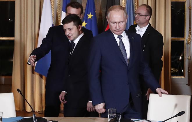 Russian President Vladimir Putin, right, and Ukrainian President Volodymyr Zelenskyy. File