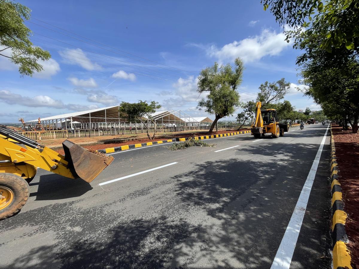 The newly-laid road in front of the BDA ground at Kommaghatta for the PM’s public rally on June 20, near Kengeri in Bengaluru. The PM will land in Yelahanka Air Force Base in north Bengaluru and head to Kommaghatta in west Bengaluru for the public rally. The havoc created by recent rains has left a bad taste in the mouth of citizens, and the pathetic condition of roads has become a talking point. In a bid to correct this image, the BJP has decided to push a development agenda for the city. According to senior civic officials. the Chief Minister is very keen on filling potholes and re-laying roads on a war-footing.