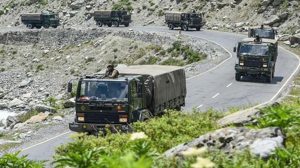   An Army convoy moves along the Srinagar-Leh National highway in Ganderbal district of central Kashmir on June 17, 2020. 