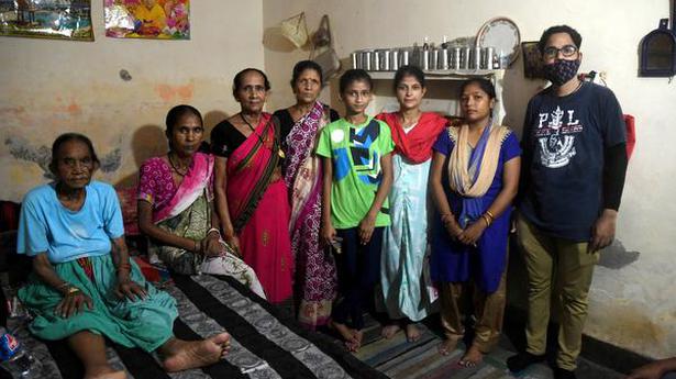 A year after deluge, slum victims wait for rehabilitation
