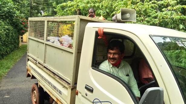 Sullia TP president drives vehicle collecting garbage