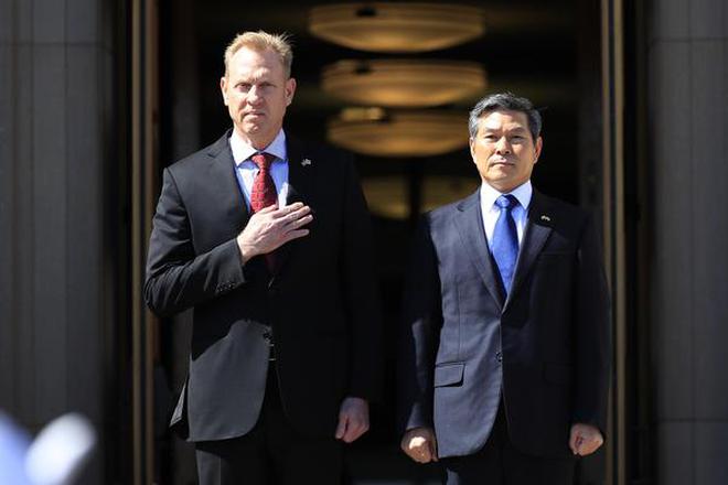 Acting Secretary of Defense Patrick Shanahan welcomes South Korean National Defense Minister Jeong Kyeong-doo, during a ceremony at the Pentagon in Washington, on Monday.