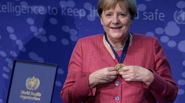 Merkel steps down with legacy dominated by tackling crises