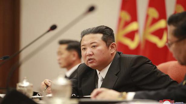 North Korea's Kim talks food not nukes for 2022