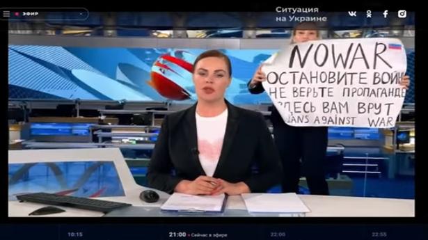 Anti-war protester in studio interrupts live Russian news broadcast
