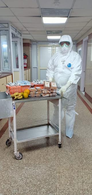 A health worker carrying CSIR-CFTRI high protein biscuits to the Covid-19 patients being treated at the All India Institute of Medical Sciences in New Delhi.