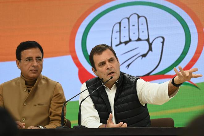 Congress president Rahul Gandhi, along with party spokesperson Randeep Surjewala, addresses the media in New Delhi on Thursday.