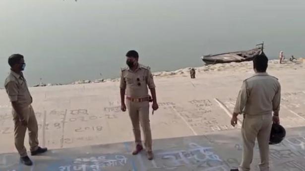 About two dozen decomposed bodies wash up on banks of the Ganga in Ghazipur