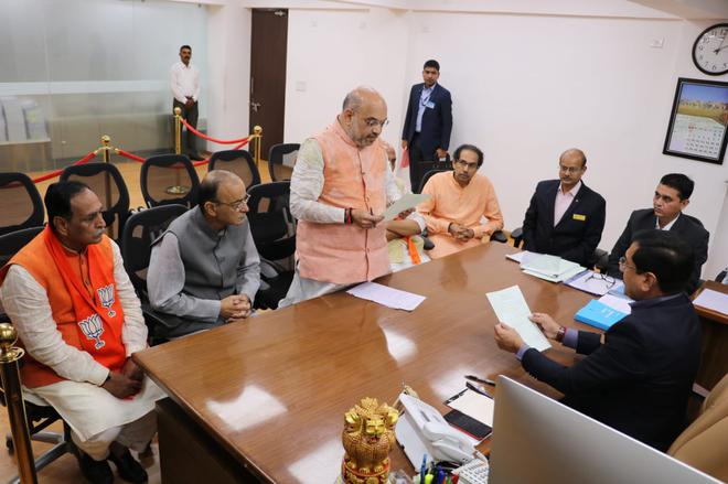 BJP president and party's candidate for Gandhinagar Parliamentary constituency Amit Shah files his nomination papers at Gandhinagar collector’s office in Gujarat on Saturday.