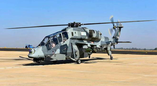 The Light Combat Helicopter, manufactured by Hindustan Aeronautics Ltd, readying for a sortie on the second day of Aero India 2019 at Yelahanka air base in Bengaluru.