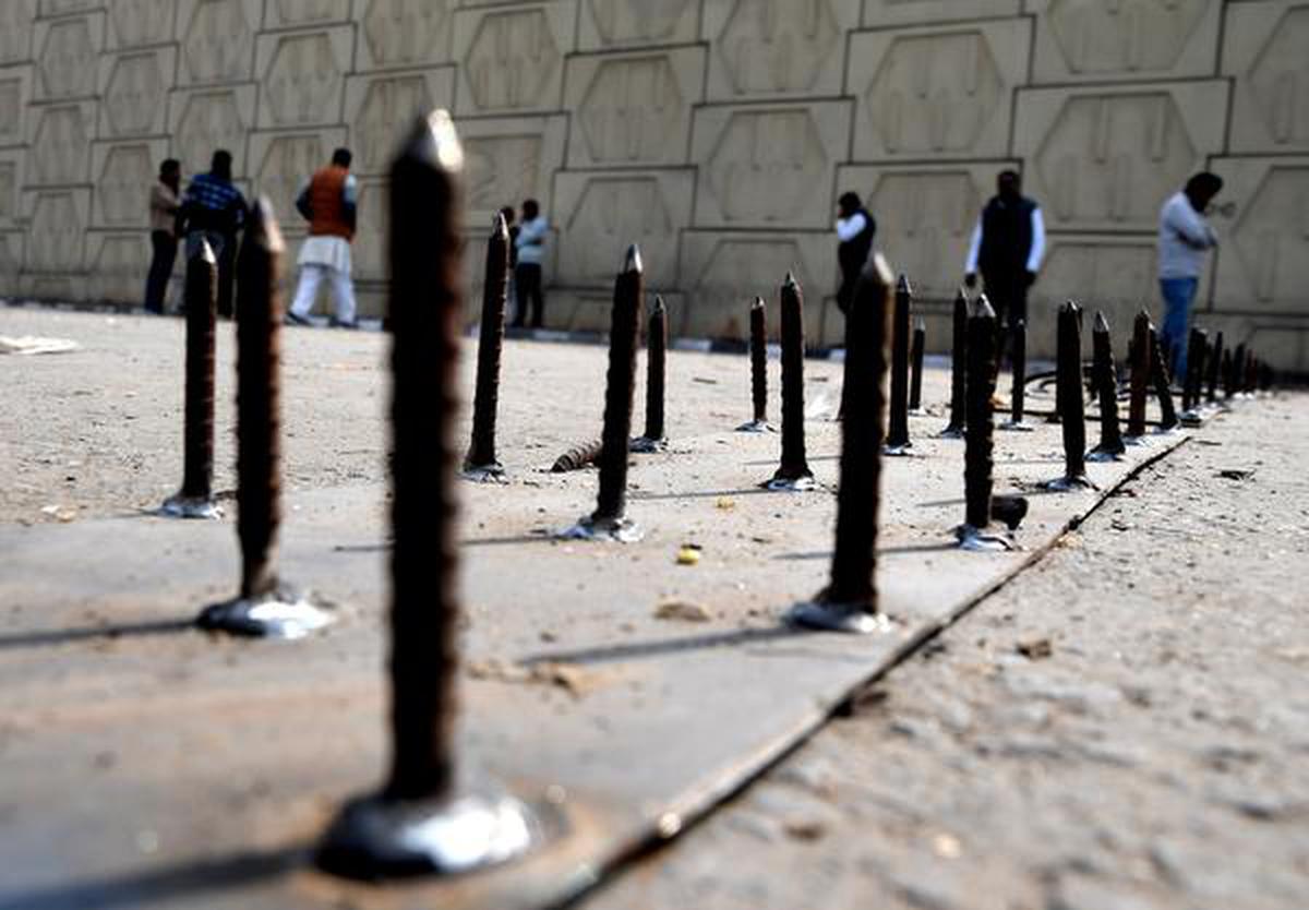 A strip of nails is placed at the heavily-barricaded Delhi-Uttar Pradesh border in Ghazipur, New Delhi on February 3, 2021.