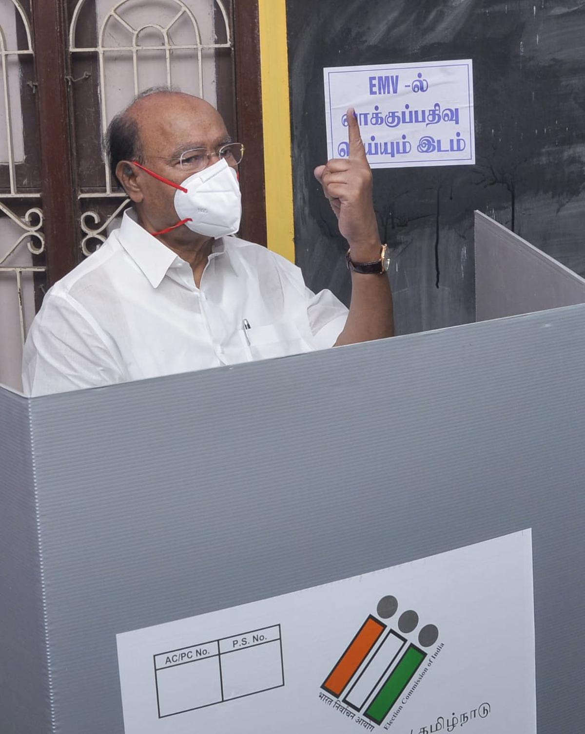 Pattali Makkal Katchi (PMK) founder Dr. S. Ramadoss exercising his franchise at a polling booth in the Sri Maragadhambigai High School in Tindivanam in Villupuram district on Tuesday.