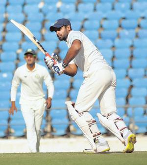 Controlled aggression: Hanuma Vihari bided his time and played a sensible knock to take Rest of India to a respectable total.