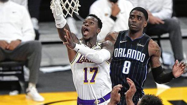 Lakers hang on for narrow win over Magic